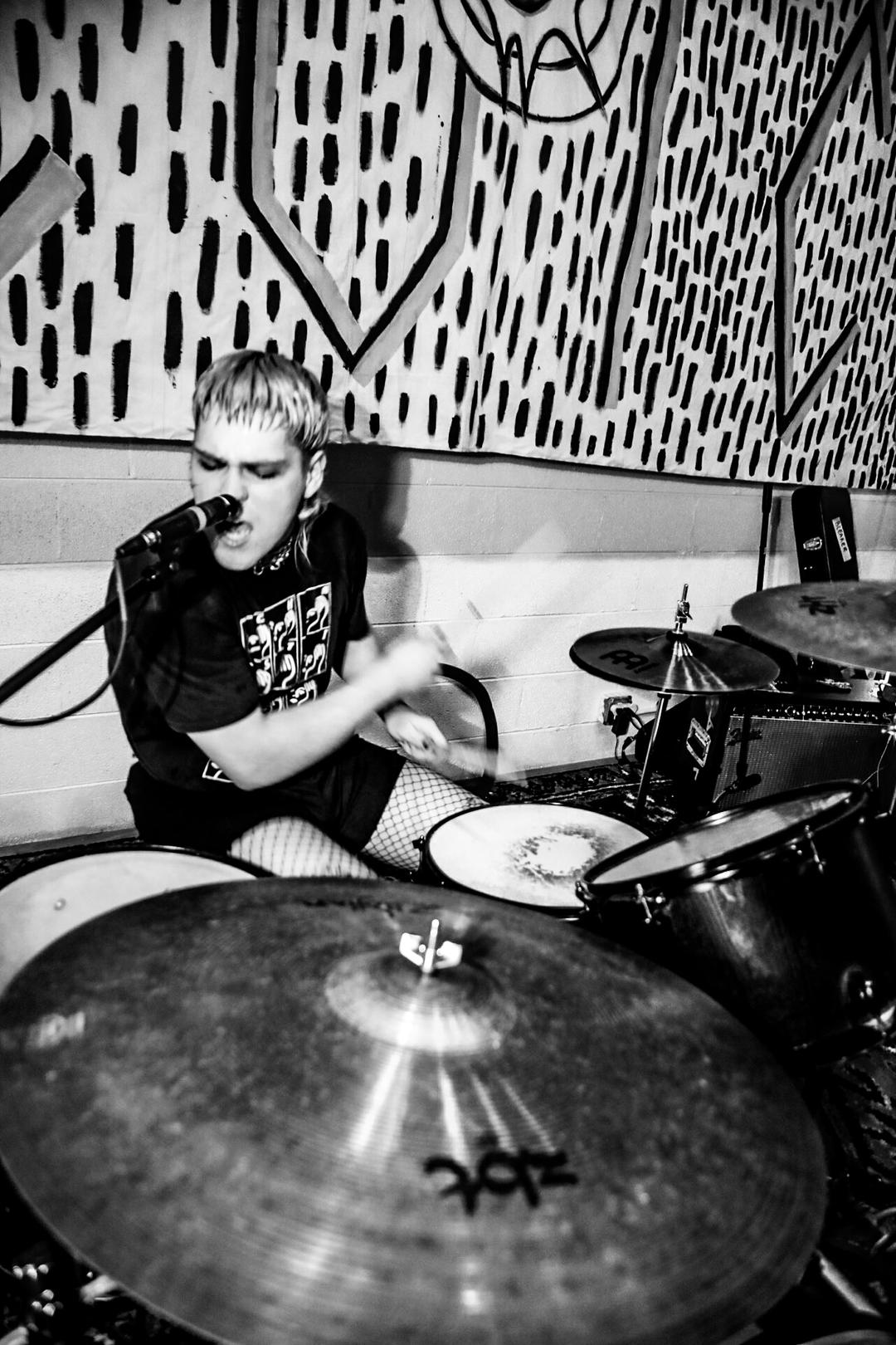 Drummer in fishnets